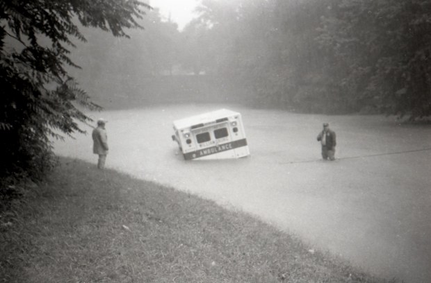 Flood waters at the south end of the Colonial Parkway tunnel under Colonial Williamsburg on Aug. 18, 1989, trapped an ambulance. Wilford Kale/freelance