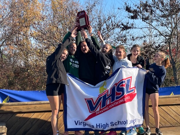 Jamestown girls celebrate Class 4 state cross country title. (Courtesy photo)