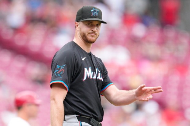 Miami Marlins pitcher Trevor Rogers reacts after a double hit by Cincinnati Reds' Jonathan India during the sixth inning of a baseball game, Sunday, July 14, 2024, in Cincinnati. (AP Photo/Jeff Dean)