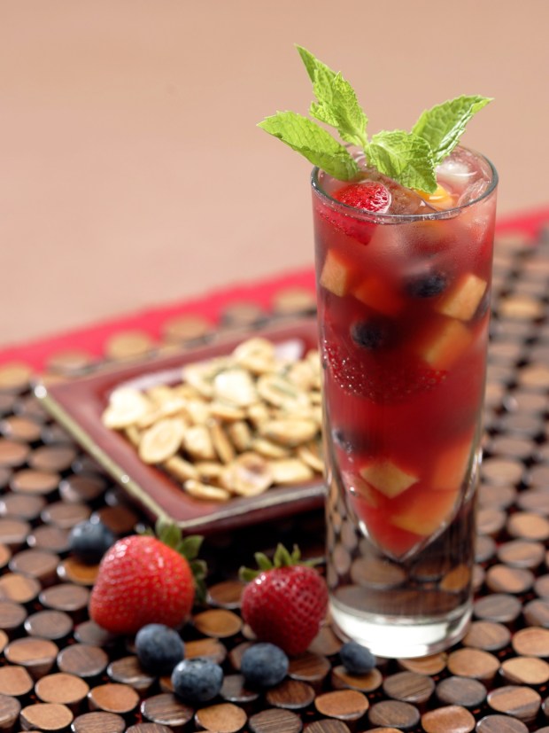 Summertime Sangria is made with wine, water, sugar, blackberries, blueberries, peaches, strawberries and orange slices. (Photo by Nick Koon, Orange County Register/SCNG)