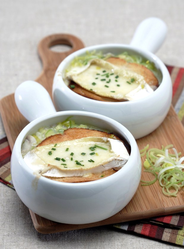 Leek and Tarragon Soup is topped with a thick slice of French bread and a melted slice of Brie. (Photo by Nick Koon, Orange County Register/SCNG)