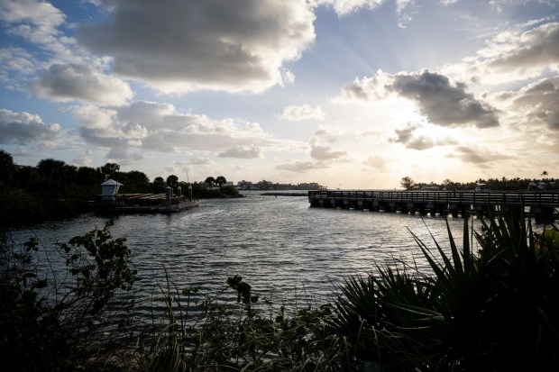 The sun rises over the snorkeling lagoon on Peanut Island, an 80-acre piece of land in the Intracoastal Waterway near Riviera Beach, on March 25, 2024. (Patrick Connolly/Orlando Sentinel)