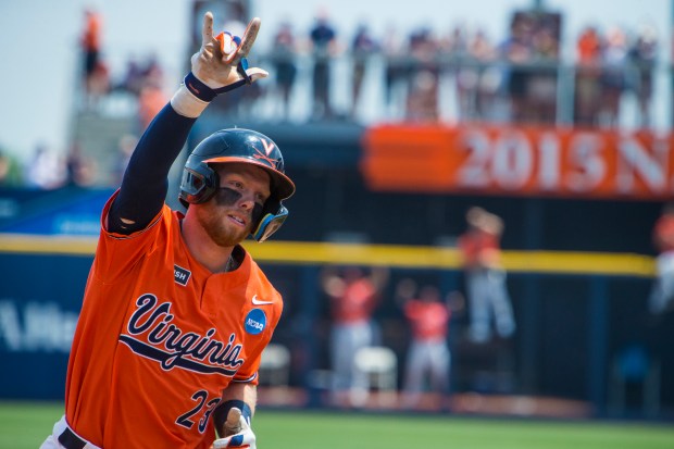 Virginia's Ethan Anderson, from Virginia Beach, rounds third base after hitting a home run in the during an NCAA Super Regional in 2023, which the Cavaliers won to advance to the College World Series. JOHN C. CLARK/AP