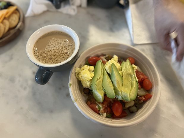 Coffee and a Veggie Brekkie Bowl at Persnickety Crane Cafe. (Nour Habib/The Virginian-Pilot/Daily Press)