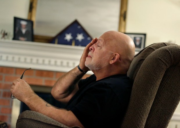 Robert Decker wipes tears from his eyes while talking about his son Kody, a 22-year-old sailor who died by suicide Oct. 29, 2022 after a tumultuous deployment aboard the Norfolk-based USS Bataan. As seen Wednesday, April 12, 2023.