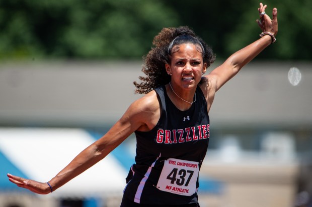 Grassfield's Sophie Rambo crosses the finish line in first place in the 100 meter dash event during the Class 6 State Championship at Todd Stadium on Saturday, June 1, 2024, in Newport News, Va. (Mike Caudill/ For The Virginian-Pilot)