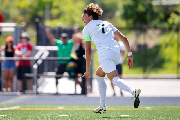 Cox Dax Booth (7) celebrates his game winning penalty kick. Cox defeated Albemarle 1-1 (5-3) in penalty kicks in the class 5 soccer state championships at J.R. Tucker High School in Henrico, Virginia, on June 8, 2024. (Billy Schuerman / The Virginian-Pilot)