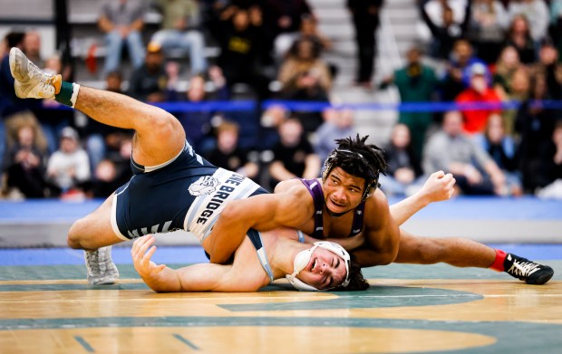 Deep Creek Samuel Diggs pins Jonathan Korte of Stone Bridge in the final seconds of the match for the class 5 weight class 175 state championship. Athletes competed in the VHSL Wrestling State Championships for classes 4, 5, and 6, at the Virginia Beach Sports Center in Virginia Beach, Virginia, on Feb 17, 2024. (Billy Schuerman / The Virginian-Pilot)