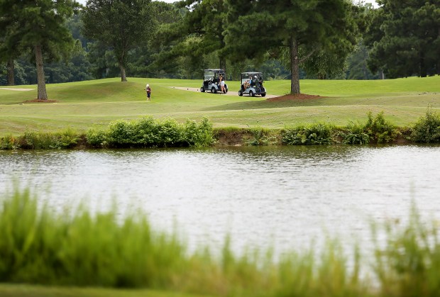 Golfers enjoy a fine afternoon playing at the Virginia Beach National Golf Club. As seen Wednesday, July 24, 2024. (Stephen M. Katz / The Virginian-Pilot)