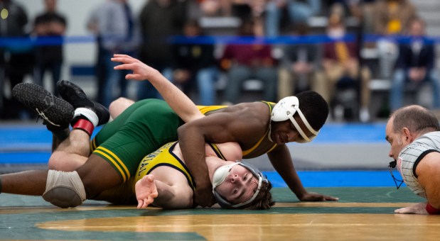 Great Bridge's Myrin Nixon pins First Colonial's Owen Cherry in the 138 pound VHSL Class 5 State Championship at the Virginia Beach Sports Center on Saturday, Feb. 17, 2024, in Virginia Beach, Va. (Mike Caudill for The Virginian-Pilot)